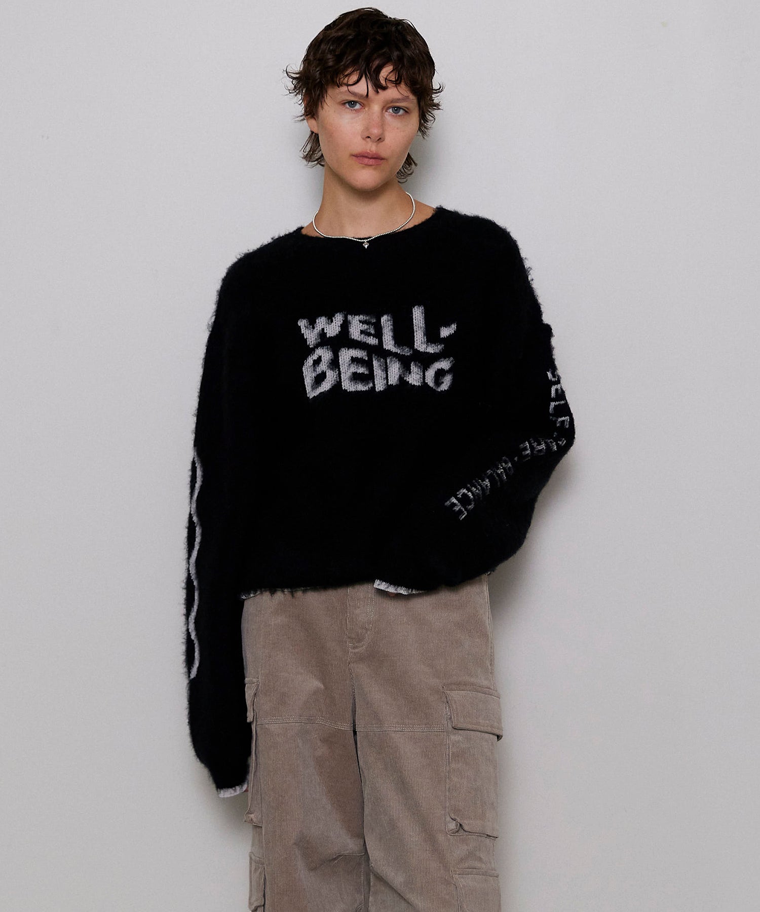 【PRE-ORDER】WELLBEING Logo Jacquard Knit Sweater