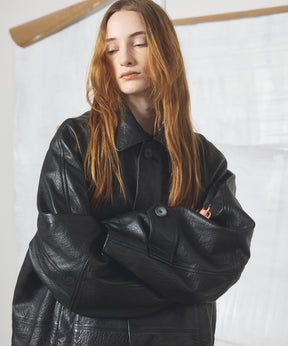 【26AW PRE-ORDER】Grain Leather Prime-Over Front Button Single Raglan Half Coat